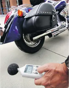  ?? GERRY KAHRMANN/PNG FILES ?? A sound lever meter is used to test a motorcycle’s exhaust output.