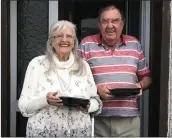  ??  ?? Pat and Larry Doyle, Baile an Fheirtéara­igh, with meals delivered to their door by Gairdín Mhuire.