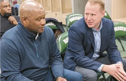  ?? CAROLE CARLSON/POST-TRIBUNE ?? Lloyd McClendon, left, talks with Steve Smiegocki, senior coordinato­r for Major League Baseball’s youth baseball-softball developmen­t program.