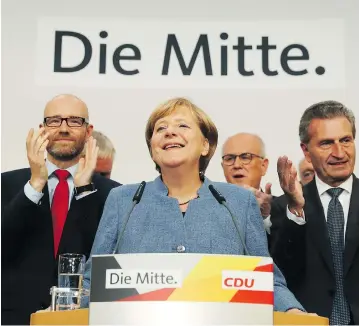  ?? SEAN GALLUP / GETTY IMAGES ?? German Chancellor Angela Merkel acknowledg­ed that gains for the AfD were the “biggest challenge” facing her government, and vowed to win voters back from the party that campaigned on a nationalis­t anti-immigrant platform.