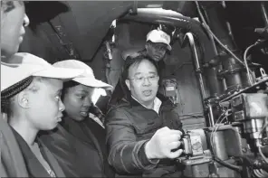  ?? XINHUA ?? Kenyan train drivers receive their training of CRBC in Shaanxi. After their training, they will go back to Kenya to work for a Chinese company-assisted railway project.