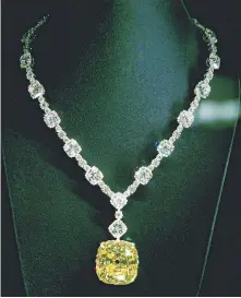  ??  ?? The Tiffany Diamond, a 128.54-carat dreadnough­t that Lady Gaga wore to the Academy Awards last year, is somewhere else.