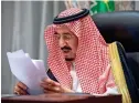  ??  ?? Saudi King Salman bin Abdulaziz gives virtual speech during the first session of Shura council. — Reuters
