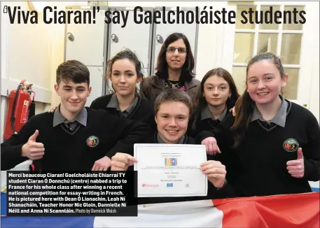  ?? Photo by Domnick Walsh ?? Merci beaucoup Ciaran! Gaelcholái­ste Chiarraí TY student Ciaran Ó Donnchú (centre) nabbed a trip to France for his whole class after winning a recent national competitio­n for essay-writing in French. He is pictured here with Dean Ó Lionachin, Leah Ní...