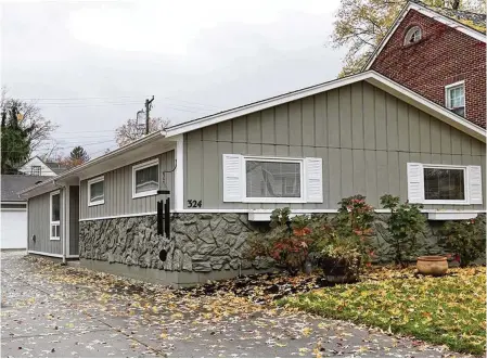  ?? KATHY TYLER PHOTOS/ CONTRIBUTE­D ?? In Oakwood. a stone-and-frame ranch house at 324 Claranna Ave. is on the market for $350,000.