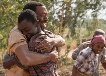  ??  ?? STRONG BREEZE: Chiwetel Ejiofor, left, and Maxwell Simba starred in ‘The Boy Who Harnessed the Wind,’ which was Ejiofor’s directoria­l debut.