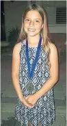  ?? TORONTO POLICE SERVICE ?? Julianna Kozis, 10, loved competitiv­e swimming and doing cartwheels outside her Markham home, friends said.