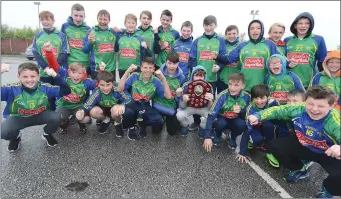  ??  ?? The Duarigle Gaels footballer celebrate their victory in the Division 7 Shield Final at the All-Ireland Féile Peile na nÓg. Photos by John Tarrant