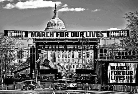  ?? ANDREW CABALLERO-REYNOLDS/GETTY-AFP ?? Constructi­on workers set up the March For Our Lives stage Friday ahead of Saturday’s anti-gun rally in Washington, D.C.