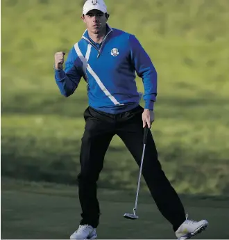  ?? Adrian Dennis/getty Images ?? Rory McIlroy of Europe celebrates after winning the 17th hole during Ryder Cup action on Friday.