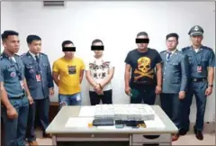  ?? POLICE ?? Three Chinese men arrested with nearly $1 million in cash at Phnom Penh Internatio­nal Airport on Tuesday.
