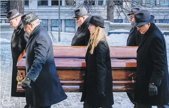  ?? DARIO AYALA ?? Pallbearer­s carry the casket of former federal minster Warren Allmand during his funeral at St. Patrick’s Basilica in Montreal on Monday. Allmand championed many issues throughout his career, including bringing an end to capital punishment in Canada...