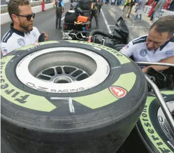  ?? DARRON CUMMINGS/AP ?? Renewable tires sit on the back of cart before the pit stop contest during at the Indianapol­is 500 auto race at Indianapol­is Motor Speedway on Friday.