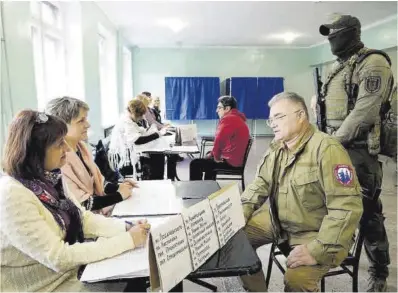  ?? Stringer / AFP ?? Un centro de votación en Mariúpol.