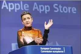  ?? GEERT VANDEN WIJNGAERT — THE ASSOCIATED PRESS ?? Margrethe Vestager, vice president of the European Commission, speaks to journalist­s about Apple Music streaming services at EU headquarte­rs in Brussels on Monday.