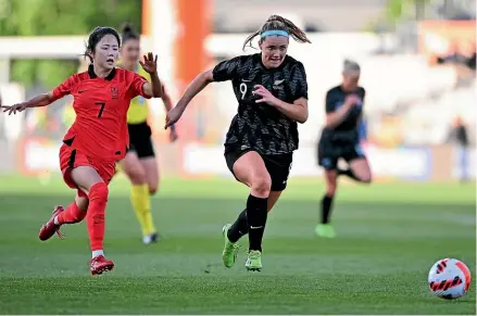  ?? KAI SCHWOERER/STUFF ?? Gabi Rennie tries to break away from Mina Lee during New Zealand’s 1-1 draw with South Korea.