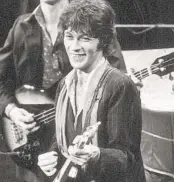  ?? JOHN STOREY AP FILE ?? Robbie Robertson performs at The Band’s final concert, which was filmed for “The Last Waltz.”