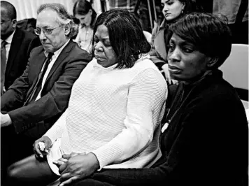  ?? SETH WENIG/AP ?? Kim Thomas, center, mother of Grafton Thomas, the man accused of stabbing multiple people at a Hanukkah gathering, sits with the Rev. Wendy Paige and attorney Michael Sussman at a news conference Monday in New York.