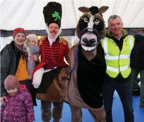  ??  ?? Carol, Doireann and Méabh O’Keeffe, Whitechurc­h and Mallow Chamber president Pat h Hayes with Damian and Shamrock the Horse at Mallow Castle during the 2018 Racing Home for Easter Festival.