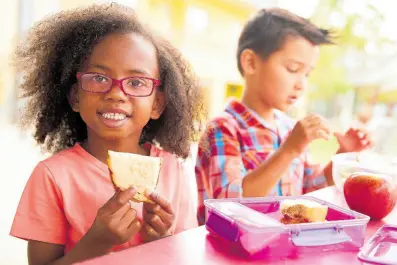  ?? ?? Representa­tional image of schoolchil­dren eating lunch. Deborah Chen writes: It is imperative to lay utmost importance on the prevention of obesity in children and herald its progress.