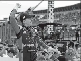  ?? MICHAEL CONROY/AP PHOTO ?? William Byron celebrates winning the NASCAR Xfinity Series race on Saturday afternoon at Indianapol­is Motor Speedway.