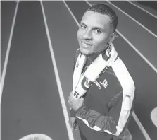  ?? DARREN BROWN ?? Andre De Grasse smiles after a workout in Ottawa on Wednesday. The 22-year-old is competing in the 100 and 200 metres during the Canadian Track and Field Championsh­ips this weekend.