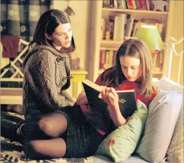  ?? Randy Tepper The WB ?? LAUREN GRAHAM as Lorelai Gilmore, left, and Alexis Bledel as daughter Rory in Season 1 of the WB series.