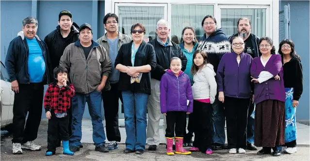  ?? LIAM RICHARDS/POSTMEDIA NEWS ?? Family and friends of Bobby Bird gather at the Battleford­s Indian and Métis Friendship Centre for a feast to honour the boy’s spirit.