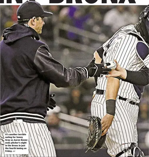  ?? AP ?? It’s another terrible outing for Sonny Gray as Aaron Boone ends pitcher’s night in the Bronx in just the fourth inning on Friday.