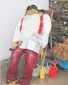  ?? ?? Making the news A scarecrow pictured in the village during a previous Gala Week