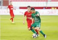  ??  ?? Players of Shabab Al Ahli and Fujairah in action during their Arabian Gulf League match on Friday.