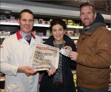  ??  ?? At Corrigan’s Spar, Oulart were Lar Corrigan, proprietor; Imelda Goff, Oulart, winner €20 and PJ Banville, advertisin­g executive, Enniscorth­y Guardian.