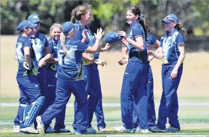  ?? PHOTOS: GETTY IMAGES ?? Fourmidabl­e . . . Otago Sparks bowler Kate Heffernan (holding cap) is congratula­ted by teammates after dismissing Amy Satterthwa­ite, of the Canterbury Magicians, during the women’s twenty20 final in Rangiora on Saturday. It was one of Heffernan’s...