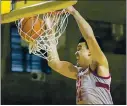  ?? TONY AVELAR — THE ASSOCIATED PRESS ?? Stanford forward Spencer Jones dunks against No. 24 UCLA during the first half in Santa Cruz on Saturday.