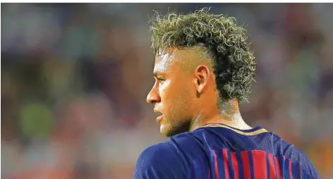  ?? FOTO: TROTMAN/AFP ?? Für den Brasiliane­r Neymar wird so viel Geld auf dem Transferma­rkt bewegt wie für keinen anderen Fußballpro­fi zuvor.