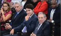  ?? SEAN KILPATRICK, THE CANADIAN PRESS ?? Trudeau and Cuban President Raúl Castro, bottom right, at the university.