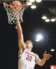  ?? Marcio Jose Sanchez / Associated Press ?? Stanford forward Reid Travis (20 points) drives to the basket against Montana during the second half.