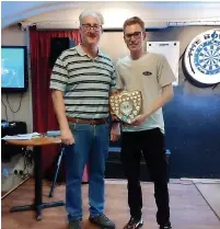  ?? ?? ● Records secretary Colin Rigby (left) presenting the 501 Individual­s Shield for the 2021/2022 season to Peter Fisher
