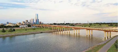  ?? [PHOTO BY DAVE MORRIS, THE OKLAHOMAN] ?? The Oklahoma River trails at Western Avenue and along Wheeler Park is a barren stretch with the north shore exposed to nearby Interstate 40. The Oklahoma City Community Foundation is set to plant wildflower­s and 1,000 trees and add stone benches to beautify the corridor.