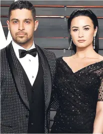  ??  ?? Wilmer Valderrama (left) and Demi Lovato.