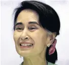  ??  ?? > Aung San Suu Kyi