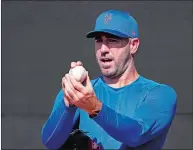  ?? JEFF ROBERSON/AP PHOTO ?? New York Mets pitcher Justin Verlander grips a ball during spring training practice on Feb. 20 in Port St. Lucie, Fla.
