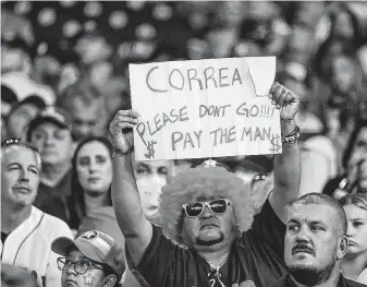  ?? Karen Warren / Staff photograph­er ?? At Game 2 of the ALCS on Saturday, fans of both teams remembered the dog days when the Astros were strangers to the playoffs and the 86 years between Red Sox championsh­ips.