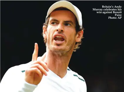  ??  ?? Britain’s Andy Murray celebrates his win against Benoit Paire Photo: AP