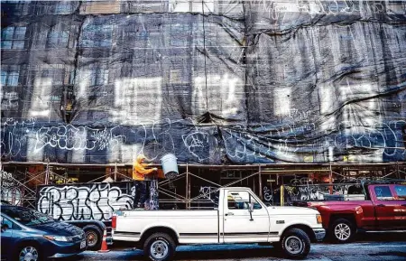  ?? Photos by Noah Berger/Special to The Chronicle ?? Constructi­on at 1605 15th St. was slowed by San Francisco’s chronic building permit delays, a problem in a housing shortage.