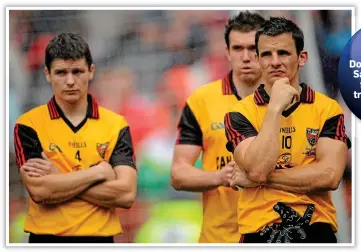  ??  ?? UPS AND
DOWNS: Danny Hughes (below left) with Ronan Murtagh (after beating Donegal in 2010 and (left, l-r) Damien Rafferty, Declan Rooney and Hughes following the All-Ireland final loss to Cork