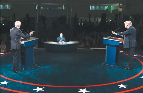  ?? AP ?? El presidente y Biden se trenzaron el martes en un debate lleno de golpes bajos. No se sabe si habrá dos cruces más.