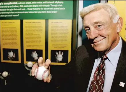  ?? Tony Dejak Associated Press ?? PHIL NIEKRO REACHED the Hall of Fame by throwing the knucklebal­l. He pitched until he was 48, winning 318 games.