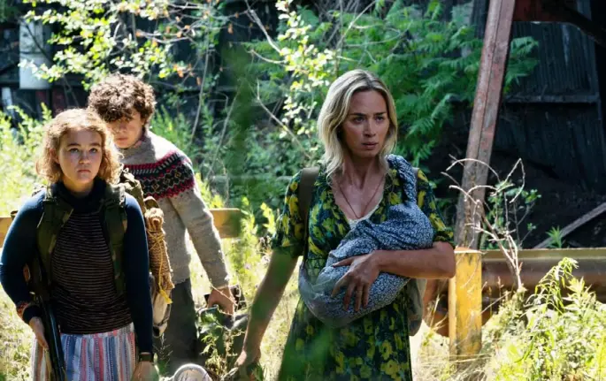  ?? Jonny Cournoyer ?? From left, Regan (Millicent Simmonds), Marcus (Noah Jupe) and Evelyn (Emily Blunt) brave the unknown in “A Quiet Place Part II.”