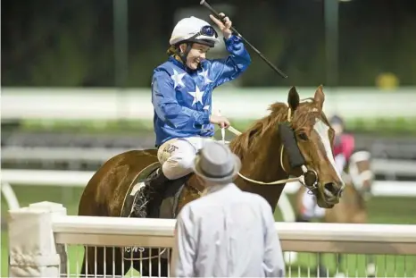  ?? PHOTO: NEV MADSEN ?? WINNING FEELING: Jockey Jodi Worley and Isla Poppy revel in winning win race three at Clifford Park.